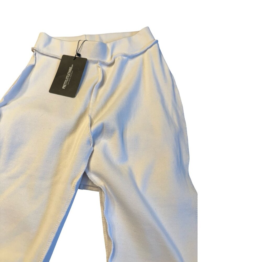 Pretty Little Things White Split Straight Leg with Flair Leggings Size 8
